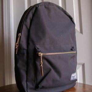 Gold Herschel Supply company backpack